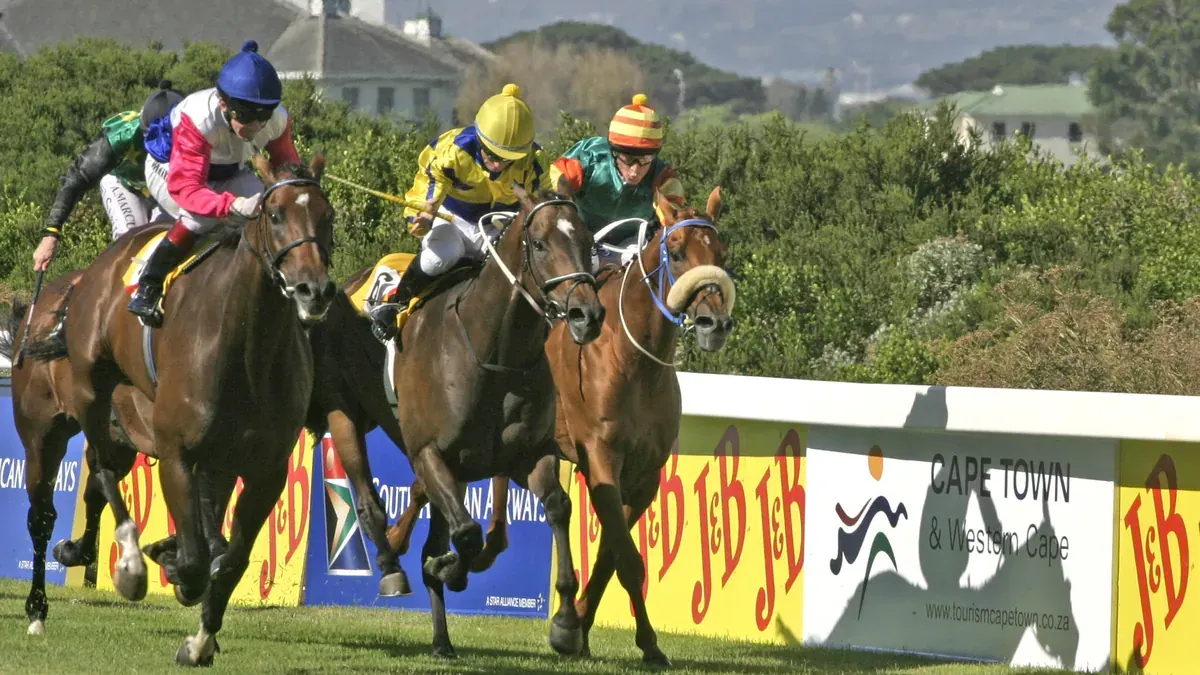 Horses racing at the J&B Met at Kenilworth Racecourse, Cape Town